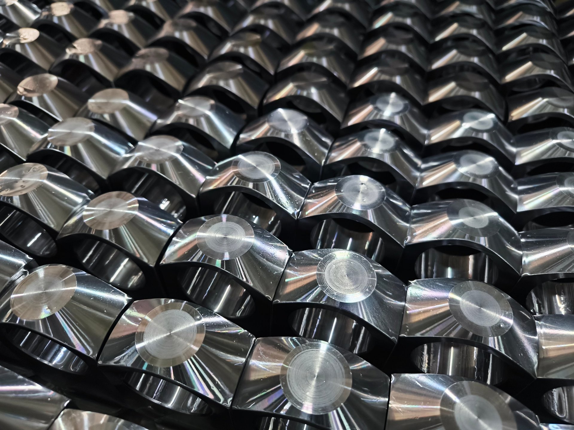 Close-Up of Machined Metal Components in Factory