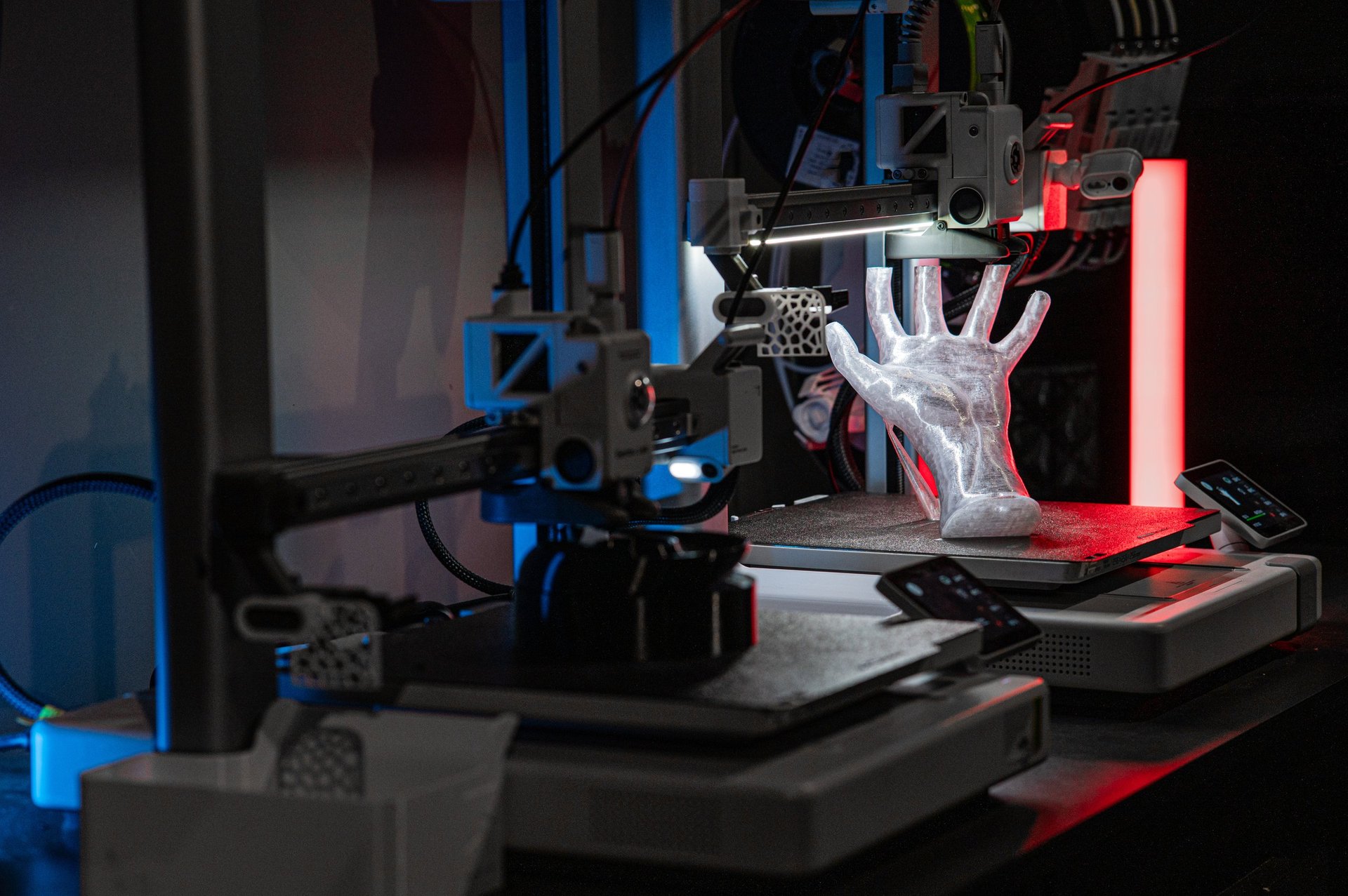 A modern 3D printer fabricating a complex object with high precision, symbolizing innovation, creativity, and advanced additive manufacturing technology.