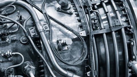 Close-up Open for service aircraft engine with many tubes of wires for valve switches and automation