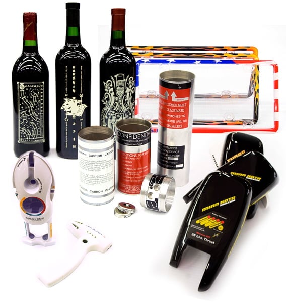 Assorted wine accessories and tools including three wine bottles, electric opener, aerator, wine stopper, and various other wine gadgets displayed on white background.